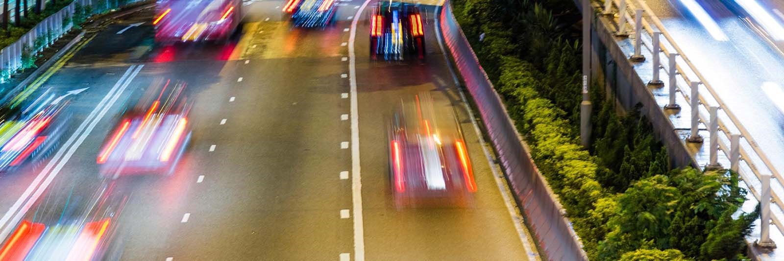 Blurry picture of traffic on a busy road